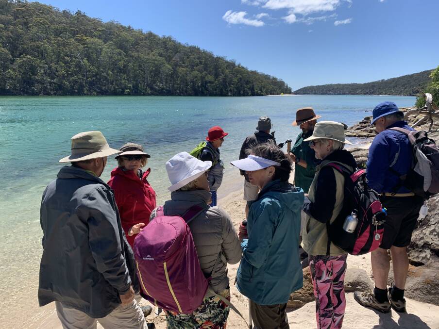 Walking next to the sapphire waters of Pambula River. Photo: Sapphire Coast Guiding Co.