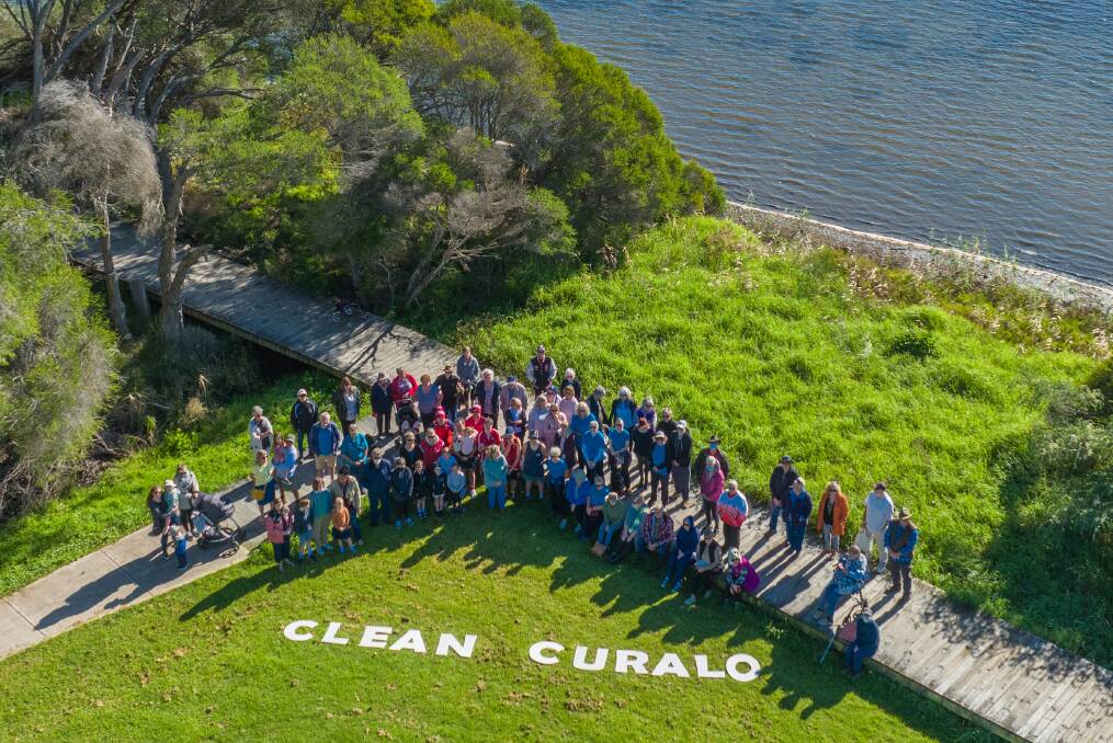 MAKING A STAND: About 75 people gathered at Lake Curalo on Saturday, May 7 to highlight concerns surrounding the health and management of the lake. Photo: DoubleTake Photography