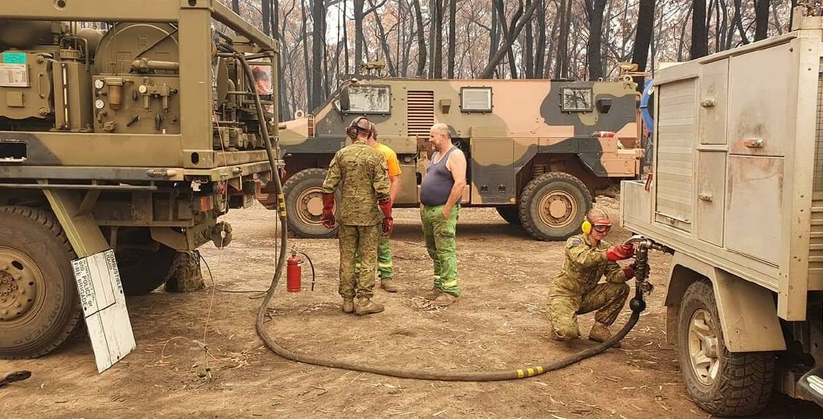 ON THE GROUND: Delivering crucial logistics to the isolated town of Mallacoota during Operation Bushfire Assist 19/20. Photo: supplied