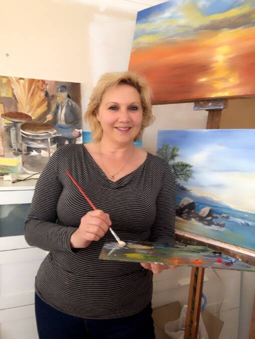 ART FOR FUN: Virginia Moschella encourages people to try their hand at painting, regardless of their level of ability.