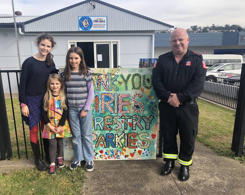 Towamba Public School students thanking Commander Nemec from Fire and Rescue NSW's Eden station following the Black Summer bushfires. Photo: Leah Szanto 