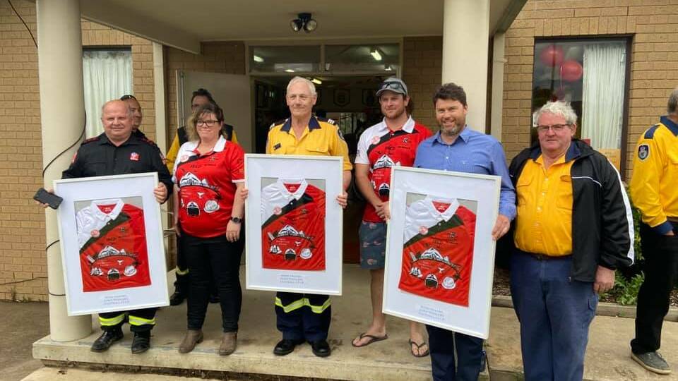 Eden firefighters honoured with Premier's citation for 'compassion, courage and generosity' during horror fires