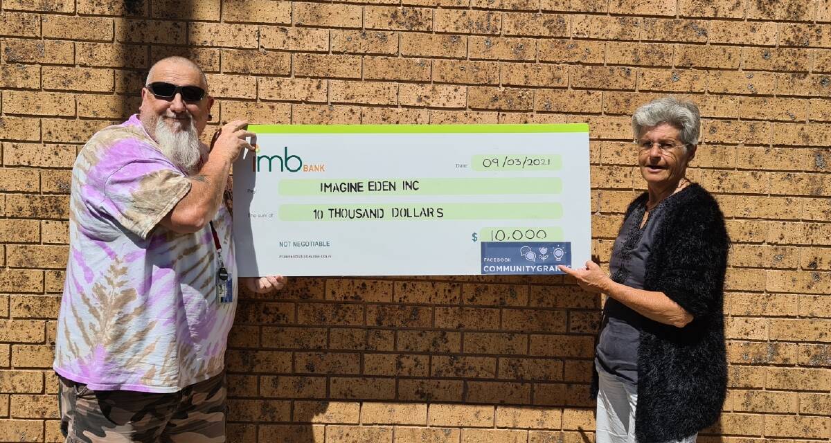 Imagine Eden treasurer Chris Bingham and chairperson Joanne Korner proudly hold the $10,000 cheque, received by the group from a Facebook community grant. Photo supplied.