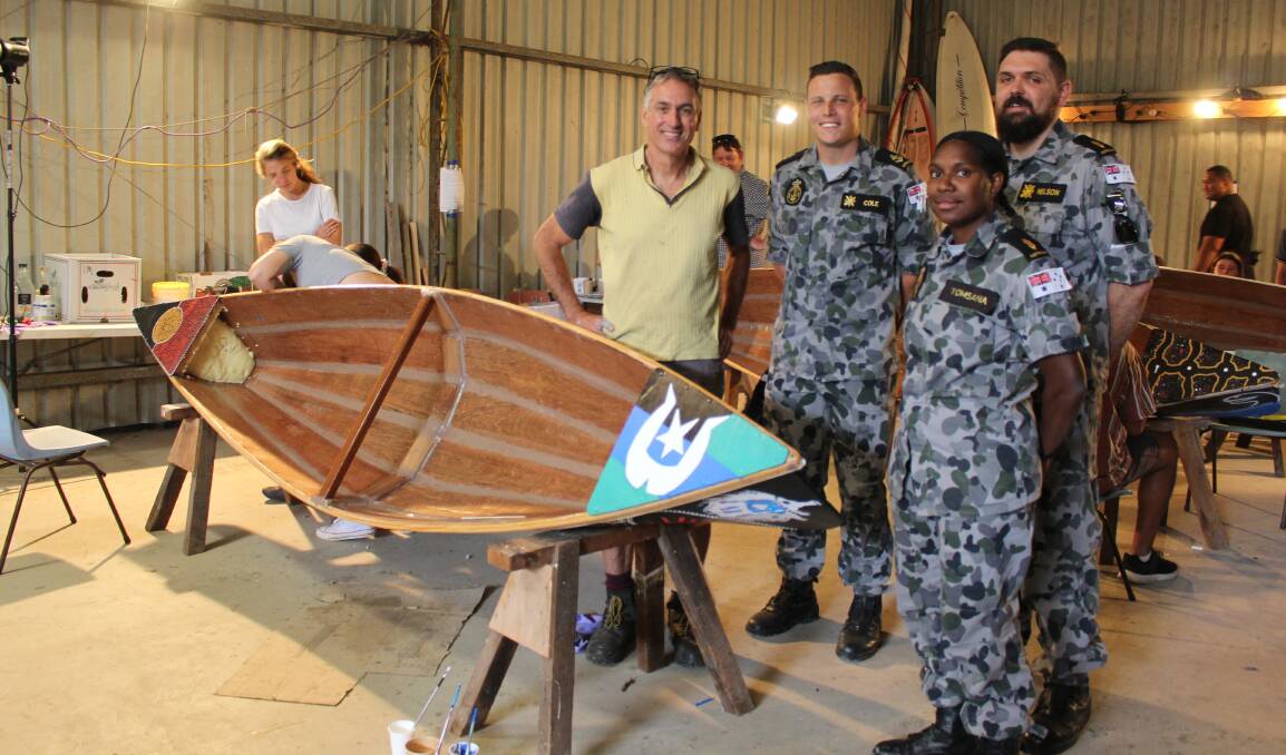 Eden Canoes project manager Michael Palmer with HMAS Supply crew LS Cole, AB Nelson and AB Tomsana. Photo: Leah Szanto