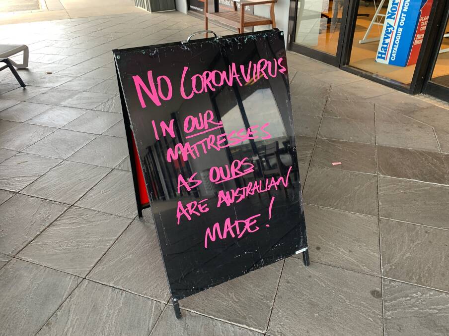 The sign was on display outside the Harvey Norman Albury store on Saturday. Picture: THE BORDER MAIL