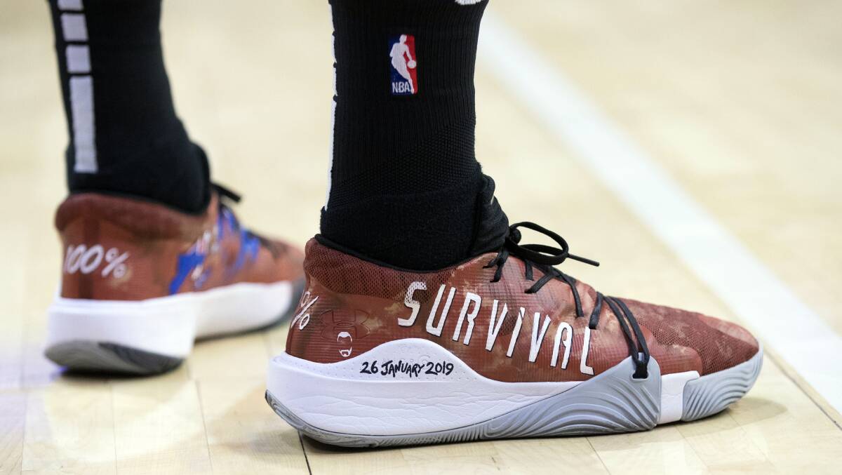 Patty Mills wore shoes to educate people about indigenous culture during an NBA game. Picture: USA TODAY Sports