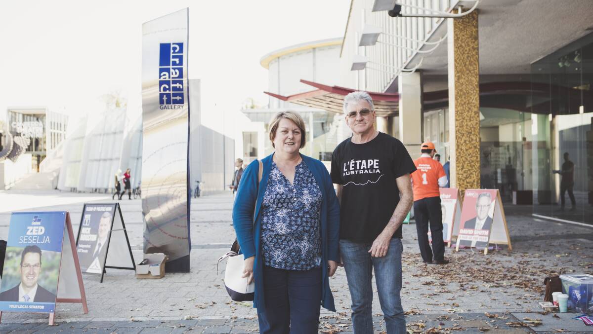 Queenslanders Karen and Frank England take part in pre-polling at the Canberra Museum and Gallery in April. Picture: Jamila Toderas