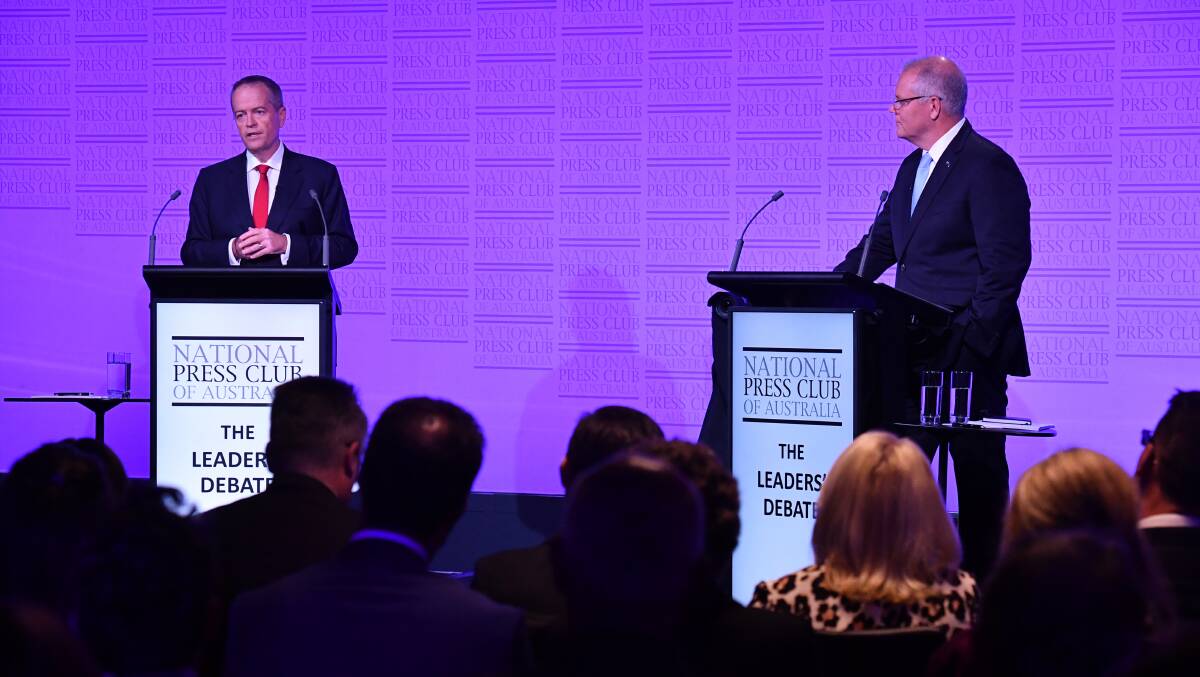 Opposition Leader Bill Shorten and Prime Minister Scott Morrison during the third leaders' debate at the National Press Club in Canberra on Wednesday. Picture: AAP Image/Mick Tsikas