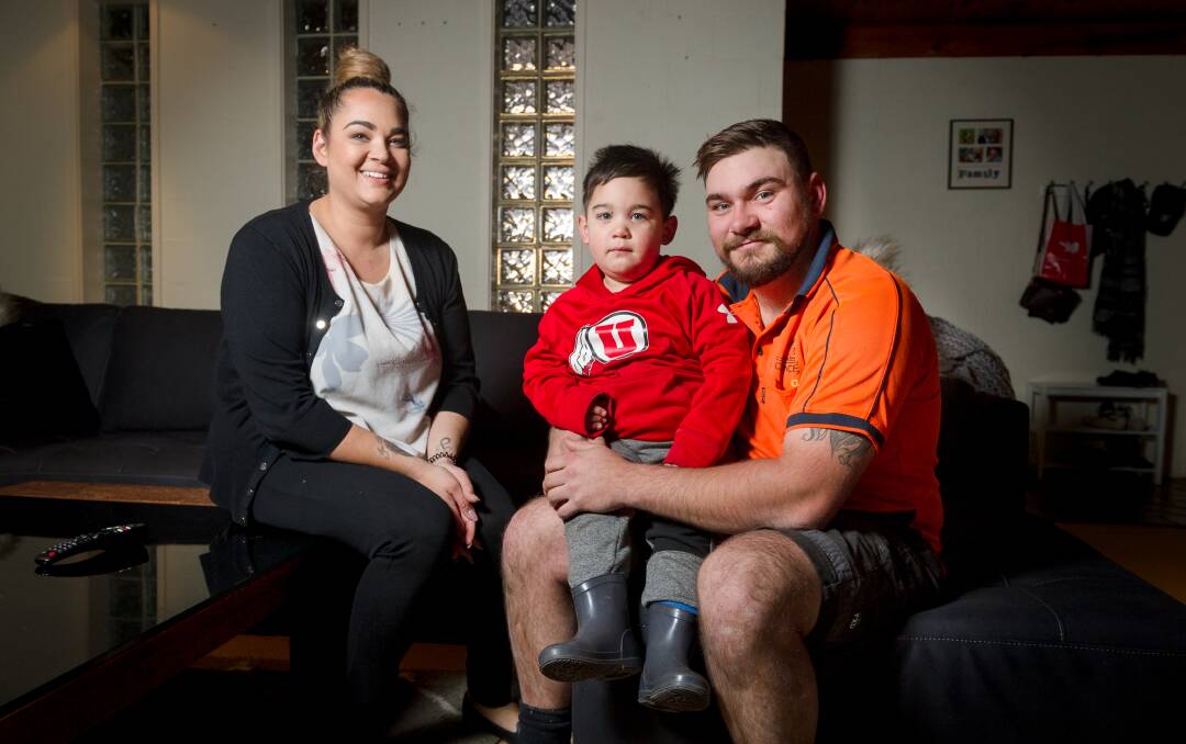 Jessica Skipper, her two-year-old son, Charlie, and partner Jake Tidey, who opted not to take advantage of the government's dad and partner pay two-week scheme as it would see a drop in the family's income. Picture: Elesa Kurtz