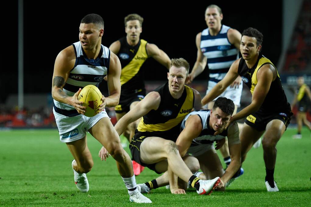 LAST ONE STANDING: Who will take home the premiership cup - Geelong or Richmond? Picture: Getty Images 