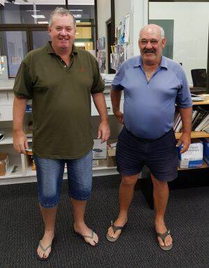 Bega Court registrar John Chalker, left, and court officer Paul McGrath, right, went to work on Monday unsure if their homes were still standing. Photo: Justice NSW
