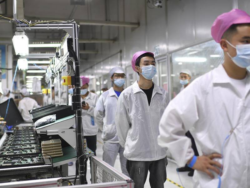 Workers at the world's biggest Apple iPhone factory have struggled with China's zero-COVID rules. (AP PHOTO)
