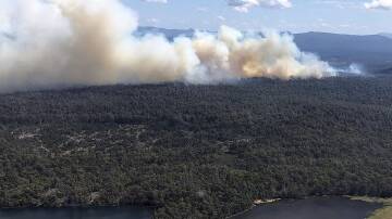 Ground crews and aircraft are trying to control three fires in Tasmania's central highlands. (HANDOUT/TASMANIA FIRE SERVICE)