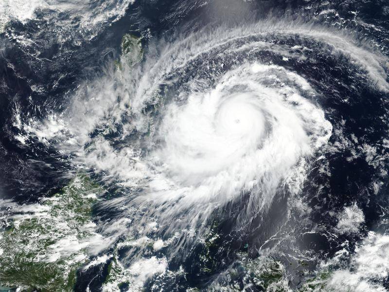 A satellite image shows typhoon Surigae approaching the Philippines.