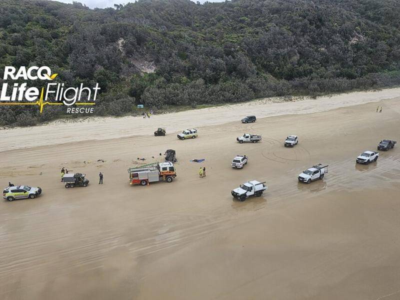 A French tourist died after a 4WD rolled at Teewah Beach north of Brisbane on Sunday. (HANDOUT/RACQ LIFEFLIGHT RESCUE)