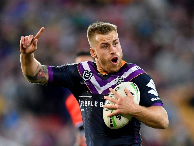 Cameron Munster has thrown his hat in the ring to take the Queensland captaincy if needed.