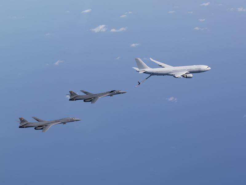 Two US Air Force heavy bombers have soared into the NT for exercises with the RAAF.