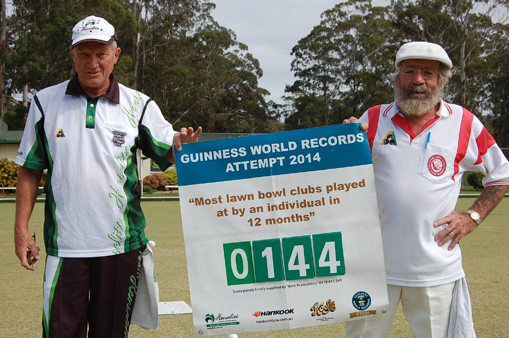Frank Peniguel (left) and Monday's opposition, Eden bowler Brian Hartin, display the "club counter" on Frank's Guinness World Record attempt.