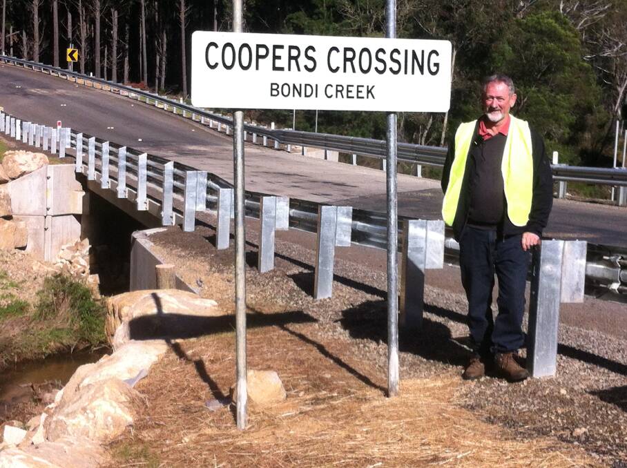 Bob Cooper beside the new ‘Coopers Crossing’, named in honour of his 42 years as a forest engineer with Forestry Corporation of NSW.