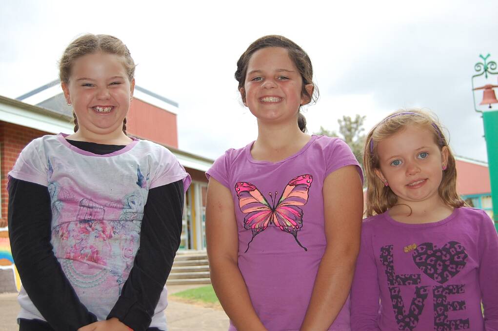 Purple Day was celebrated by (from left) Bridie Farrel, Courtney Hardy and Rhiannon Connolly at Eden Public School on Wednesday.