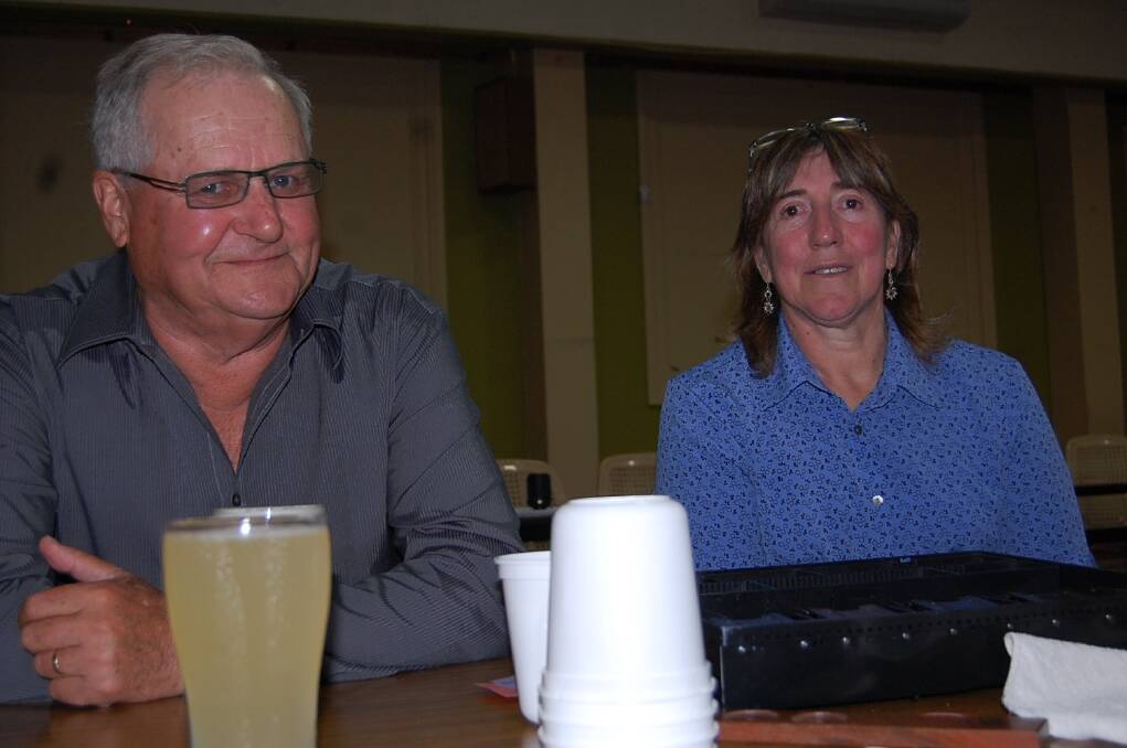 Barry Ellis and Maree O'Neill manned the till for two-up at the Eden Fishermen's Club on ANZAC Day.