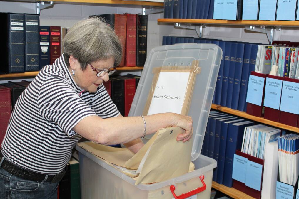 Eden Spinners group secretary Helen Gray sorts through items to be added to the custodial archive at the Eden Killer Whale Museum.