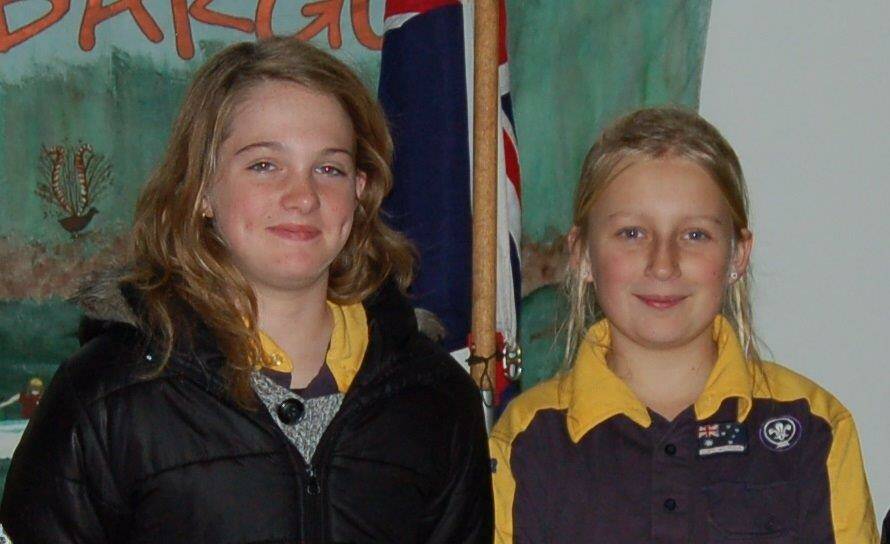 Eden cub scouts Eden Hayes-Elliott (left) and Ashley Brunette represented the town at a recent leadership camp at Tabourie Lake. Photo: Nev Cowgill.