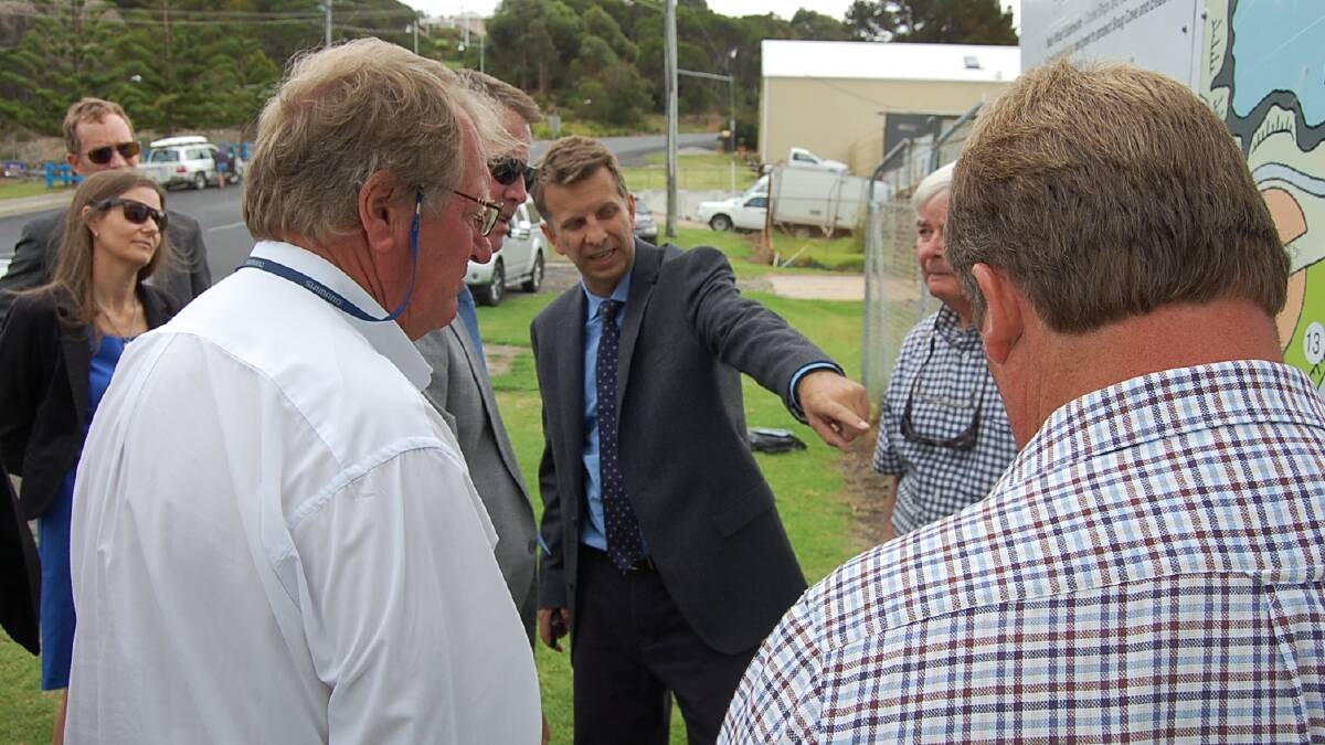 Member for Bega Andrew Constance talks Deputy Premier Andrew Stoner through an aspect of the proposal during their meeting with the Port of Eden Marina group.
