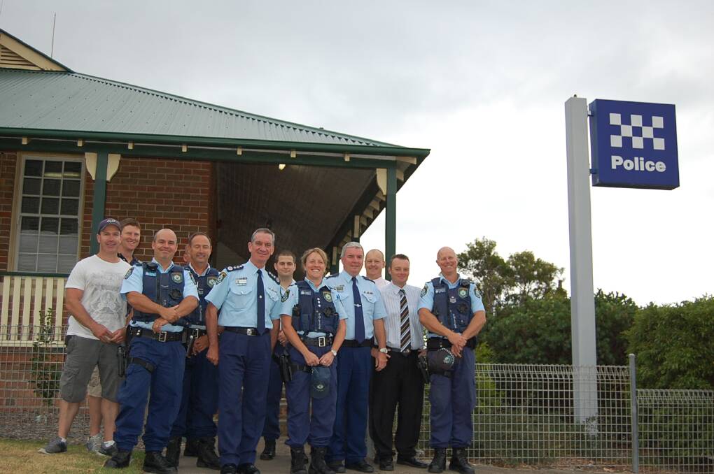Meeting the troops: NSW Police Commissioner Andrew Scipione with local officers on a tour of Eden Police Station.