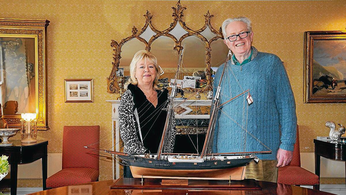 • Lord Boyd pictured with Barbara Rivers with the original shipwright’s model of Wanderer at Ince Castle, Saltash in the United Kingdom. Ben Boyd was Lord Boyd’s great, great uncle on his father’s side. PHOTO BY DAVID MARSH.