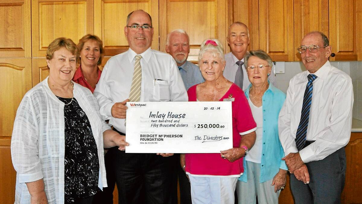 • Kim Tull, acting care manager, Imlay House (back left), Ross Williams and Michael Salkeld, both of the B M Foundation with (front) Helen Ellwood, general manager Imlay House, receiving a cheque for $250,000 from Hugo White, chair of the B M Foundation, with Mary Whitby, chair of Imlay House and Judith Dunne and Peter Went, both of the B M Foundation.