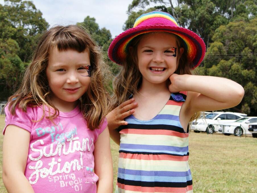Gypsy Jolly and Mikayla Armstrong (4) enjoyed the social scene at the local cricket match, showing off their Australia Day transfers.