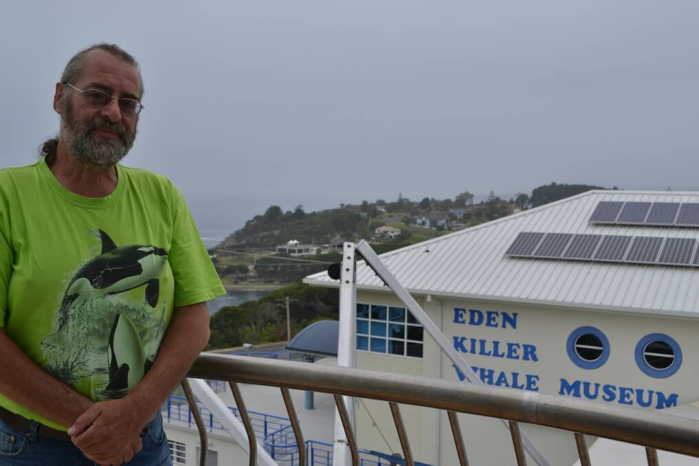 Volunteer guide Barry Smith on the balcony of the lighthouse at the Eden Killer Whale Museum.